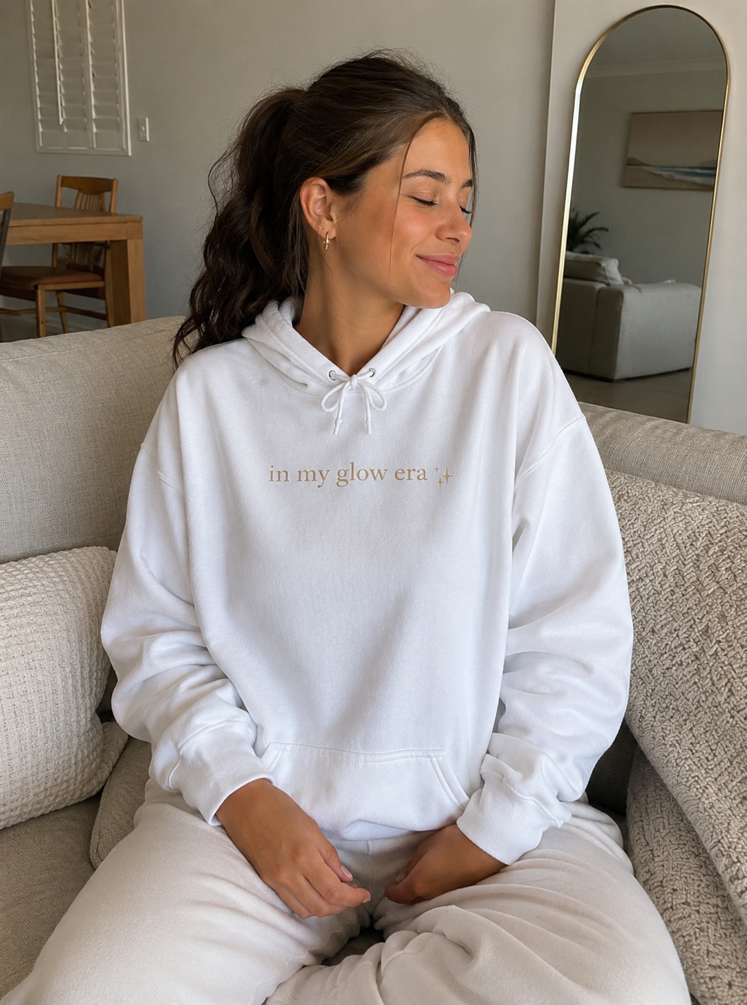 She's Becoming Her Hoodie — Inspirational White Pullover with "in my glow era" Text